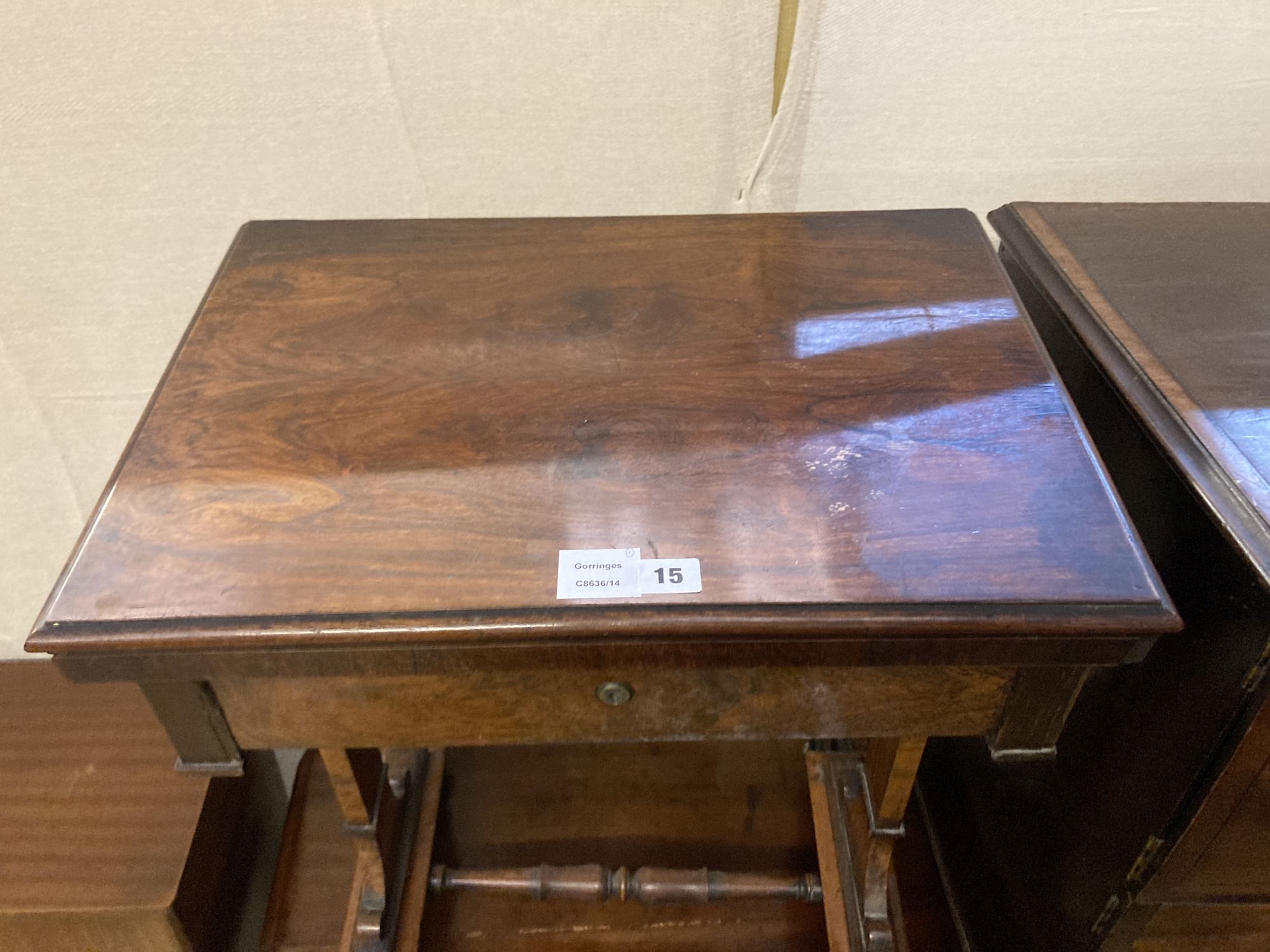 A Victorian rosewood work table, with a folding top, width 54cm depth 38cm height 71cm